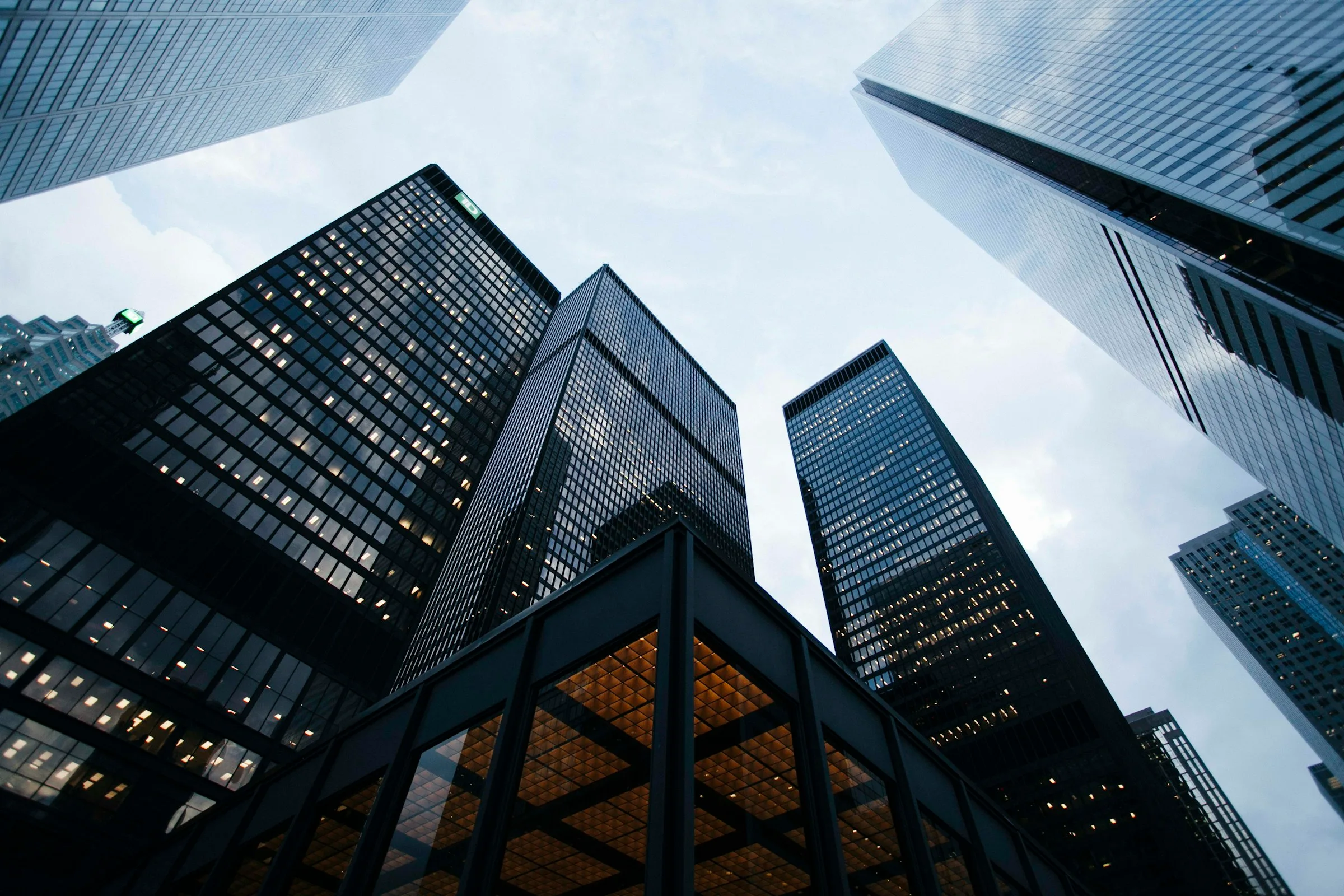 Large office towers rising around an open view of the sky